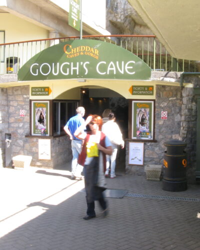 Entrance to Gough's Cave with visitors outside.