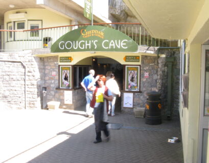 Entrance to Gough's Cave with visitors outside.